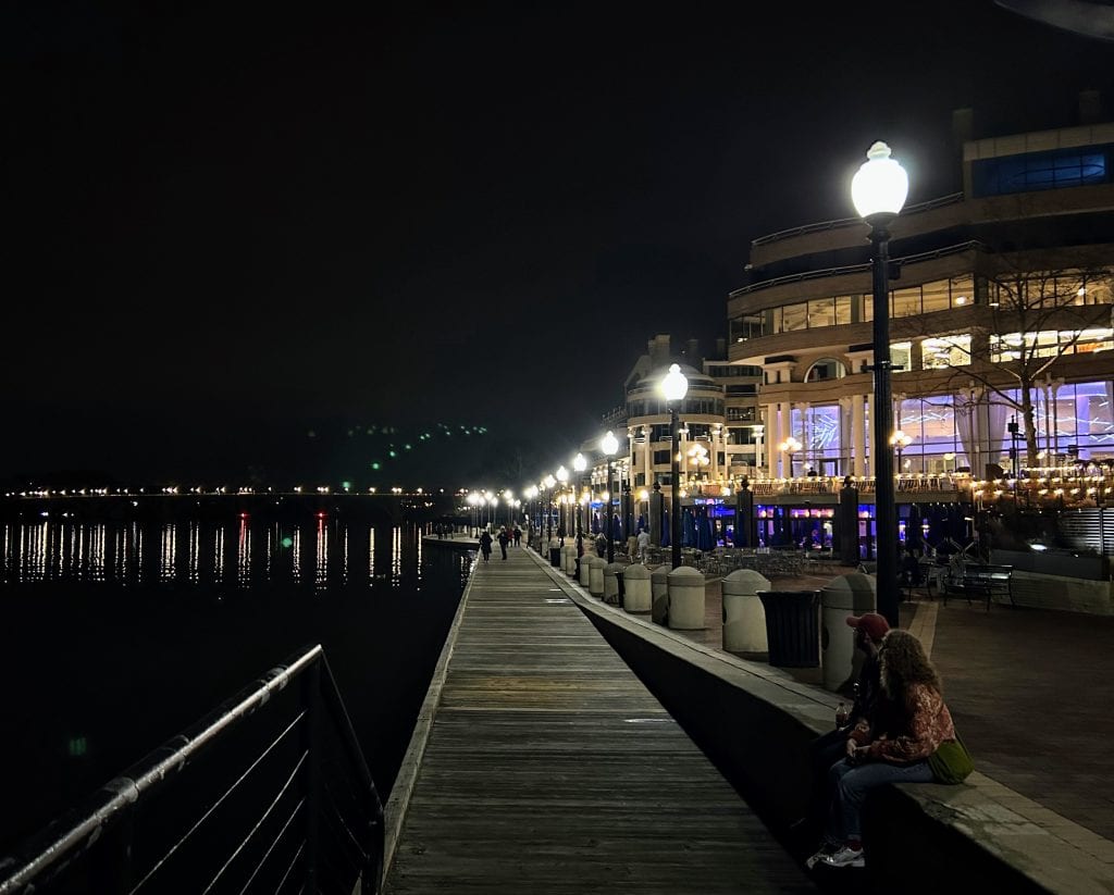 Picture down the boardwalk along the Potomac at the Georgetown waterfront in Washington DC at night