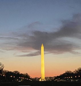Light shining on the Washington Monument just after sunset in Washington DC