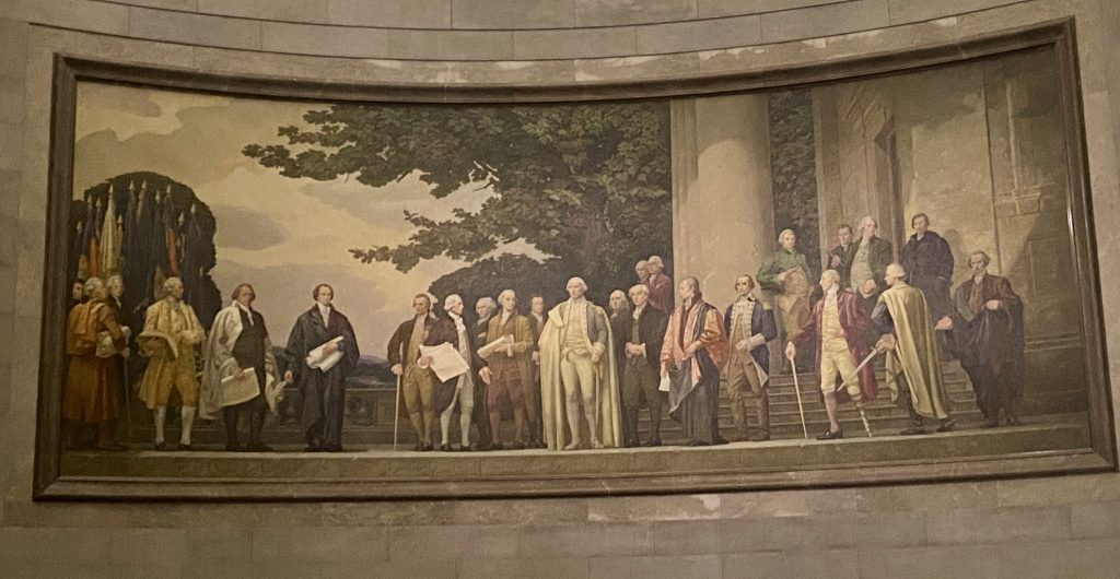 Large painting of several men standing and discussing documents