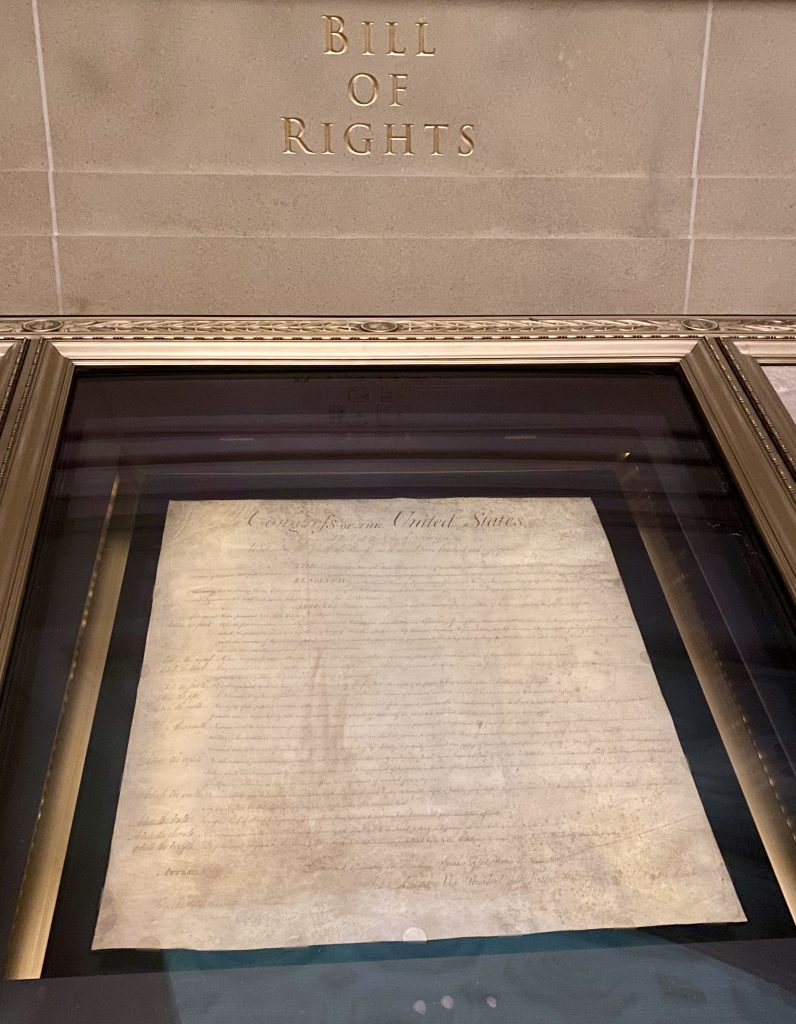 Bill of Rights in glass display case at National Archives in Washington DC