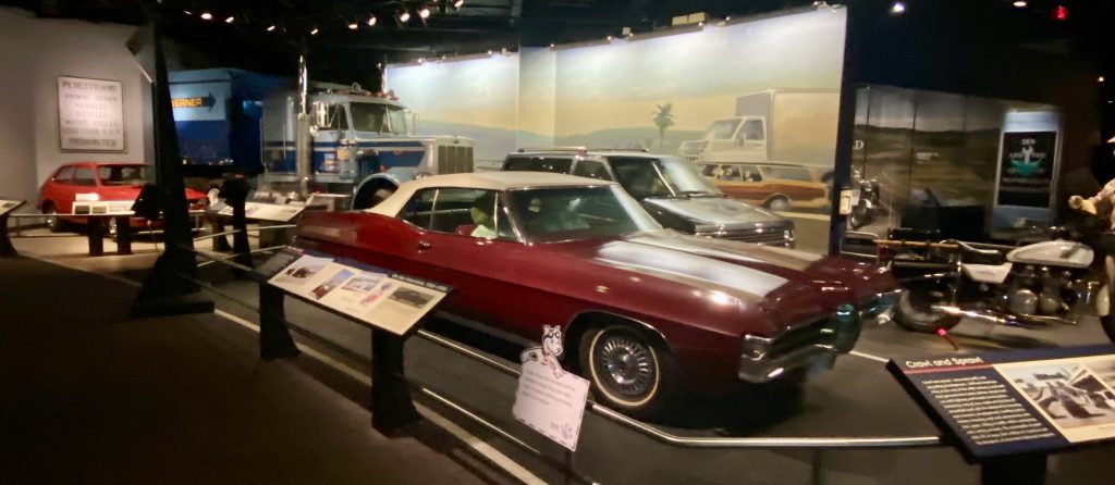 Red car with other vehicles on display at the free National Museum of American History in Washington DC