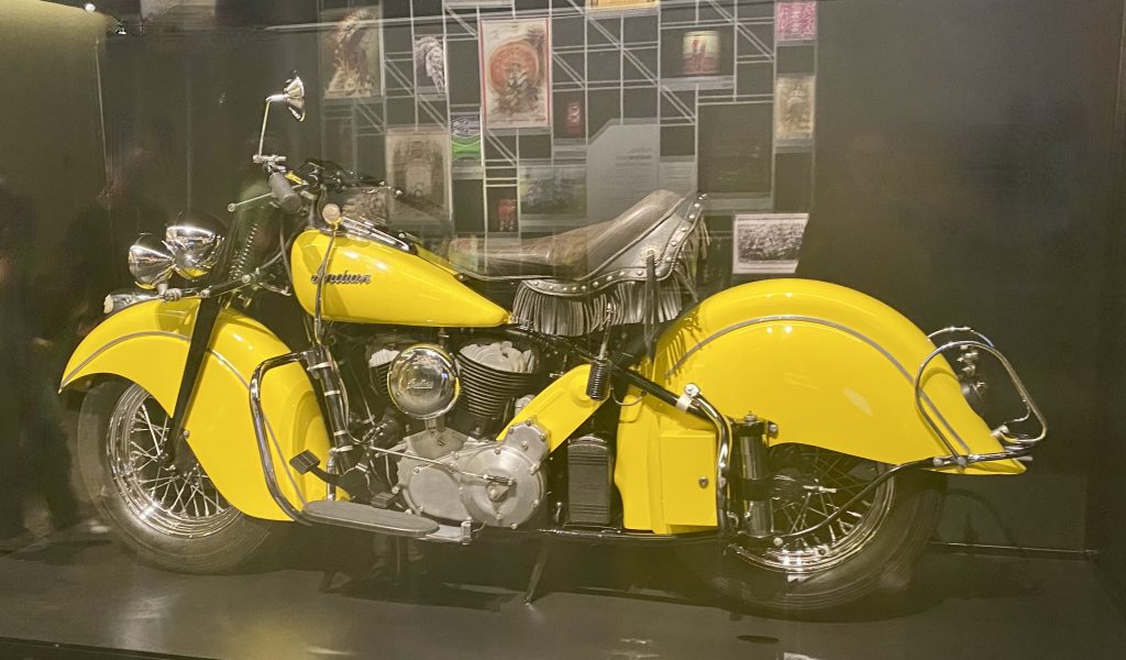 Yellow Indian motorcycle on display
