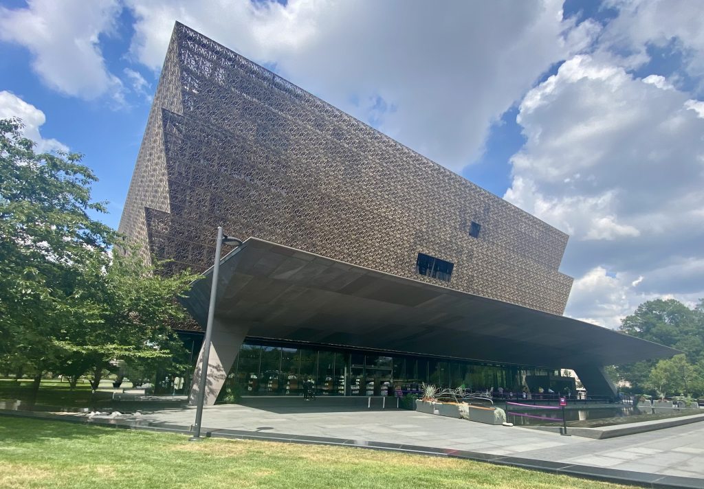 Exterior view of the African American History Museum in Washington, DC, highlighting its unique architectural design