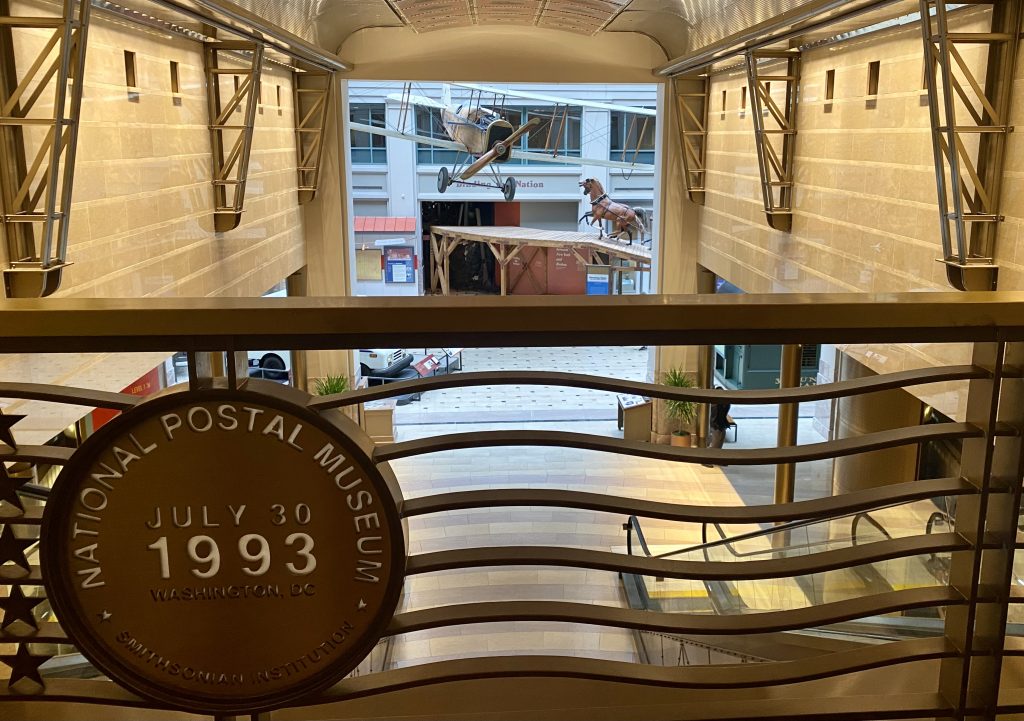 Inside of the Postal Museum in Washington DC including airplane suspended from ceiling