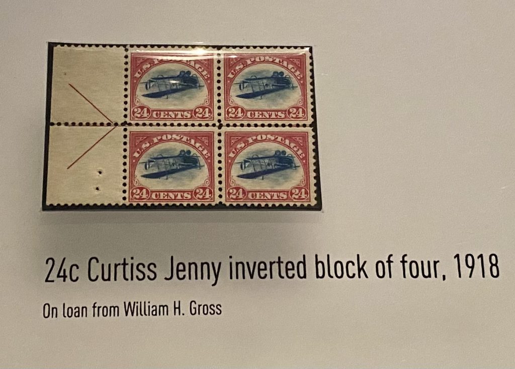 Four attached postage stamps with upside airplane, 24 cent Curtiss Jenny, 1918