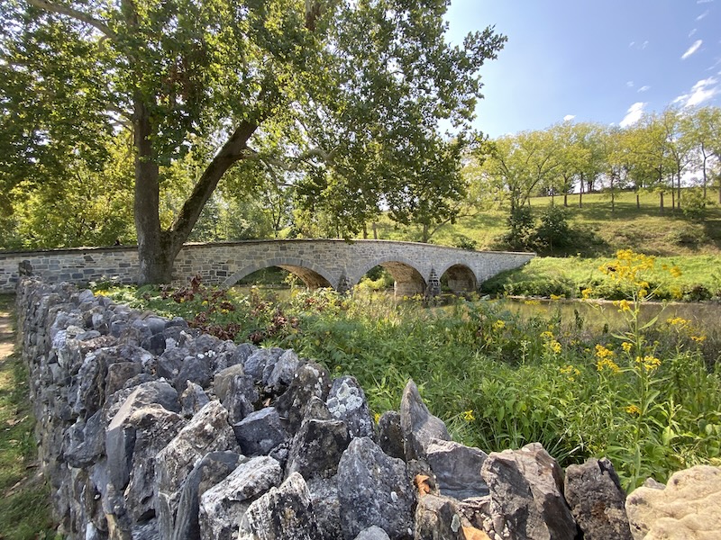 Burnside Stone Bridge over Antietam River with stone wall in foreground