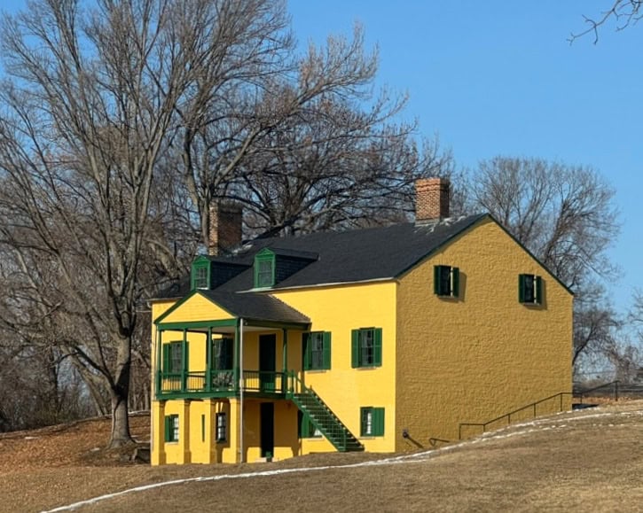 Bright yellow visitor center at Fort Washington National Park